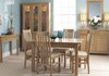 Corndell Nimbus Oak dining room furniture in Satin finish